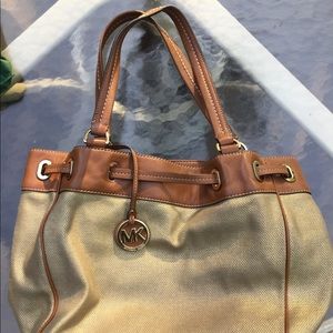 Micheal Kors Brown and Gold purse\tote